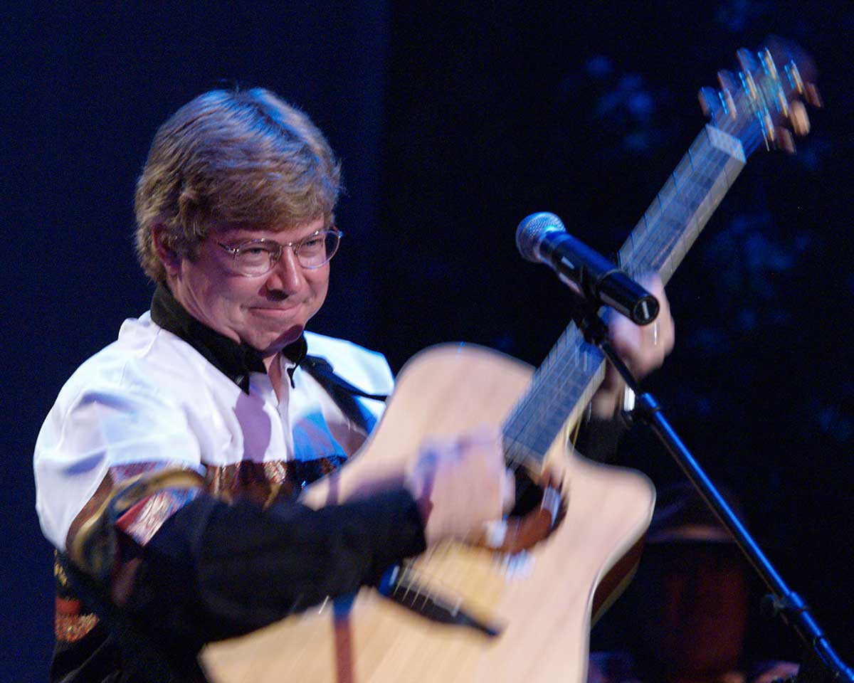 Jim Curry performs John Denver